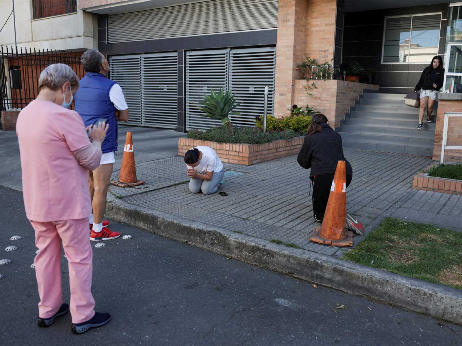 People gather outside a building following an earthquake in Bogota, Colombia (Photo/Reuters) People gather outside a building following an earthquake in Bogota, Colombia (Photo/Reuters)