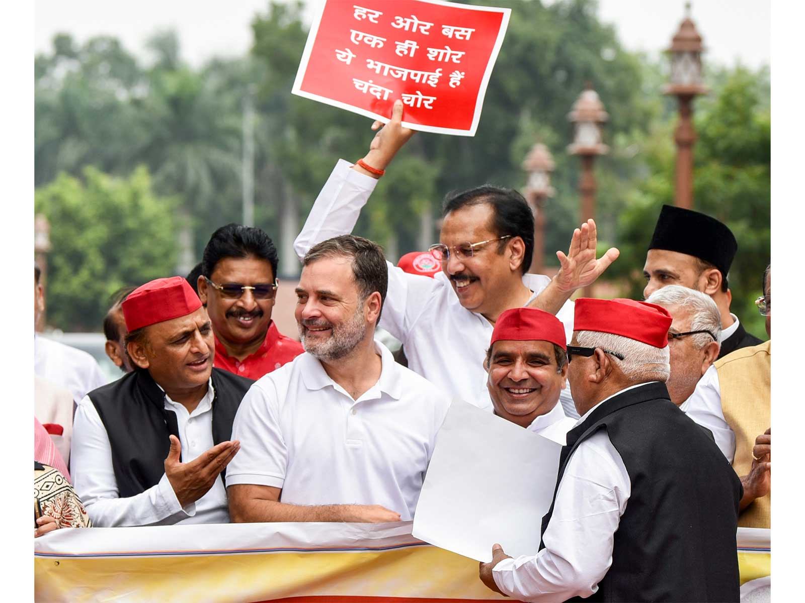 Opposition parties protest in Parliament on Monday (Photo/ANI)