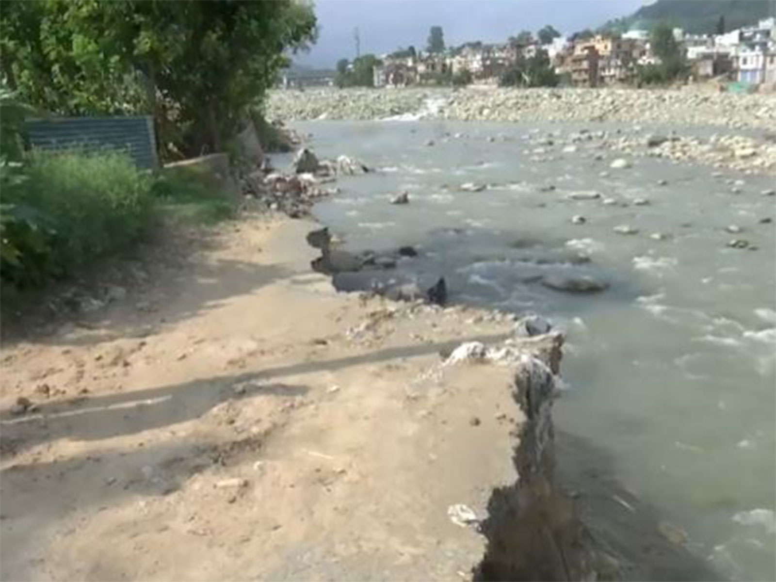 Road damage due to flash floods in Rajouri (Photo/ANI)