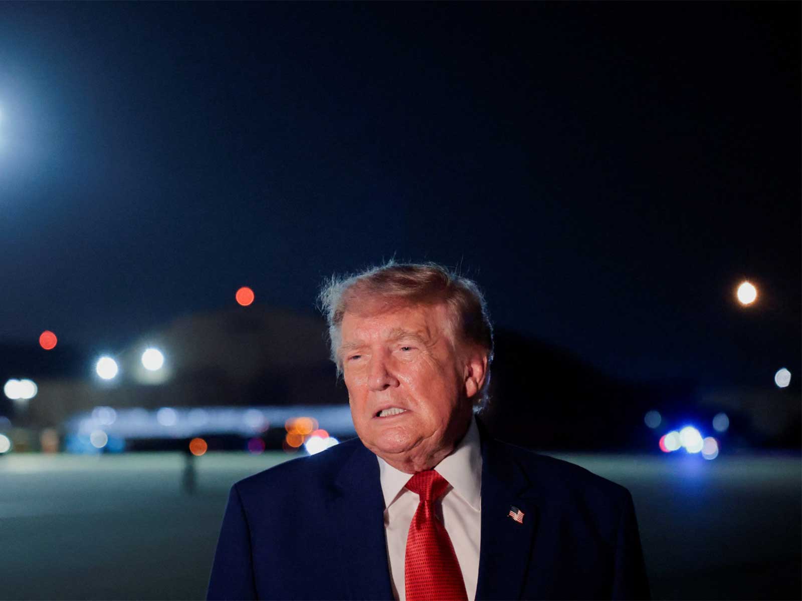 US President Donald Trump speaks to members of the media after disembarking Air Force One at Joint Base Andrews, Maryland (Photo/Reuters)