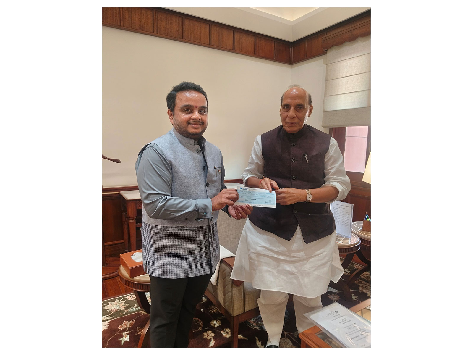 RS MP Vijay Chintakayala with Raksha Mantri Rajnath Singh (Photo/@vijaychinthak) RS MP Vijay Chintakayala with Raksha Mantri Rajnath Singh (Photo/@vijaychinthak)