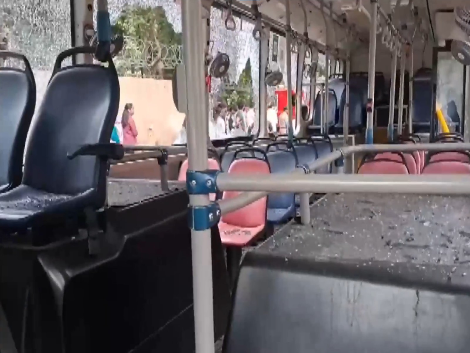 Angry mob damaged the bus (Photo/ANI) Angry mob damaged the bus (Photo/ANI)