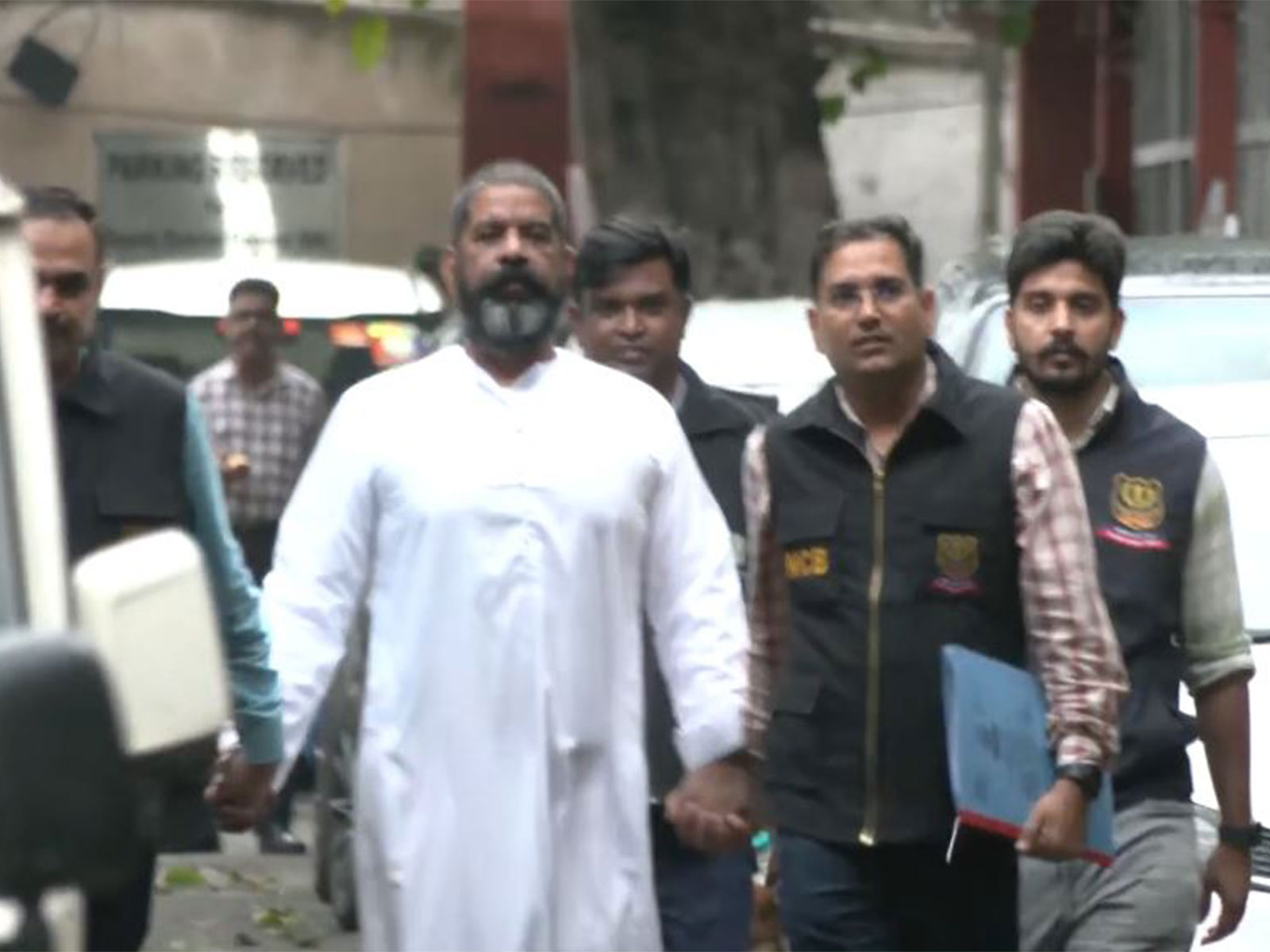 Fugitive drug kingpin Virender Singh Basoya (Photo/ANI) Fugitive drug kingpin Virender Singh Basoya (Photo/ANI)