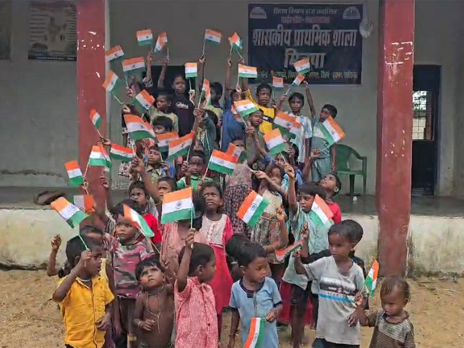 Village children in Minpa wave National Flag (Photo/ANI) Village children in Minpa wave National Flag (Photo/ANI)