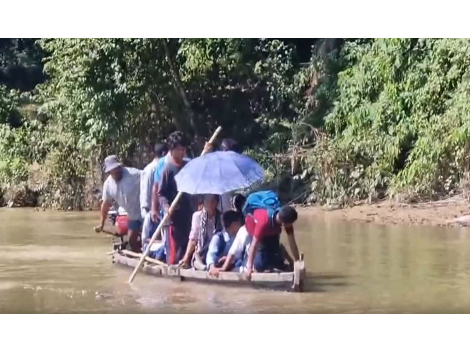 Students cross Kemi River by boats to reach school (Photo/ANI) Students cross Kemi River by boats to reach school (Photo/ANI)