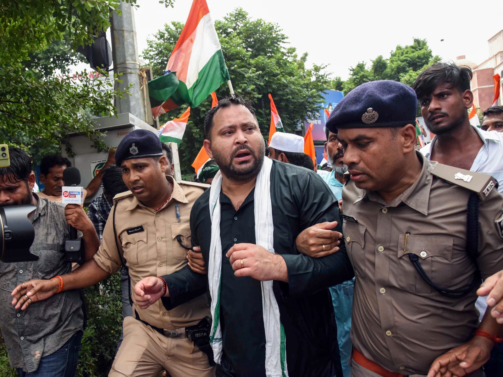 Police detain Bihar Assembly LoP and RJD leader Tejashwi Yadav during a foot march towards Lok Bhawan (Photo/ANI)