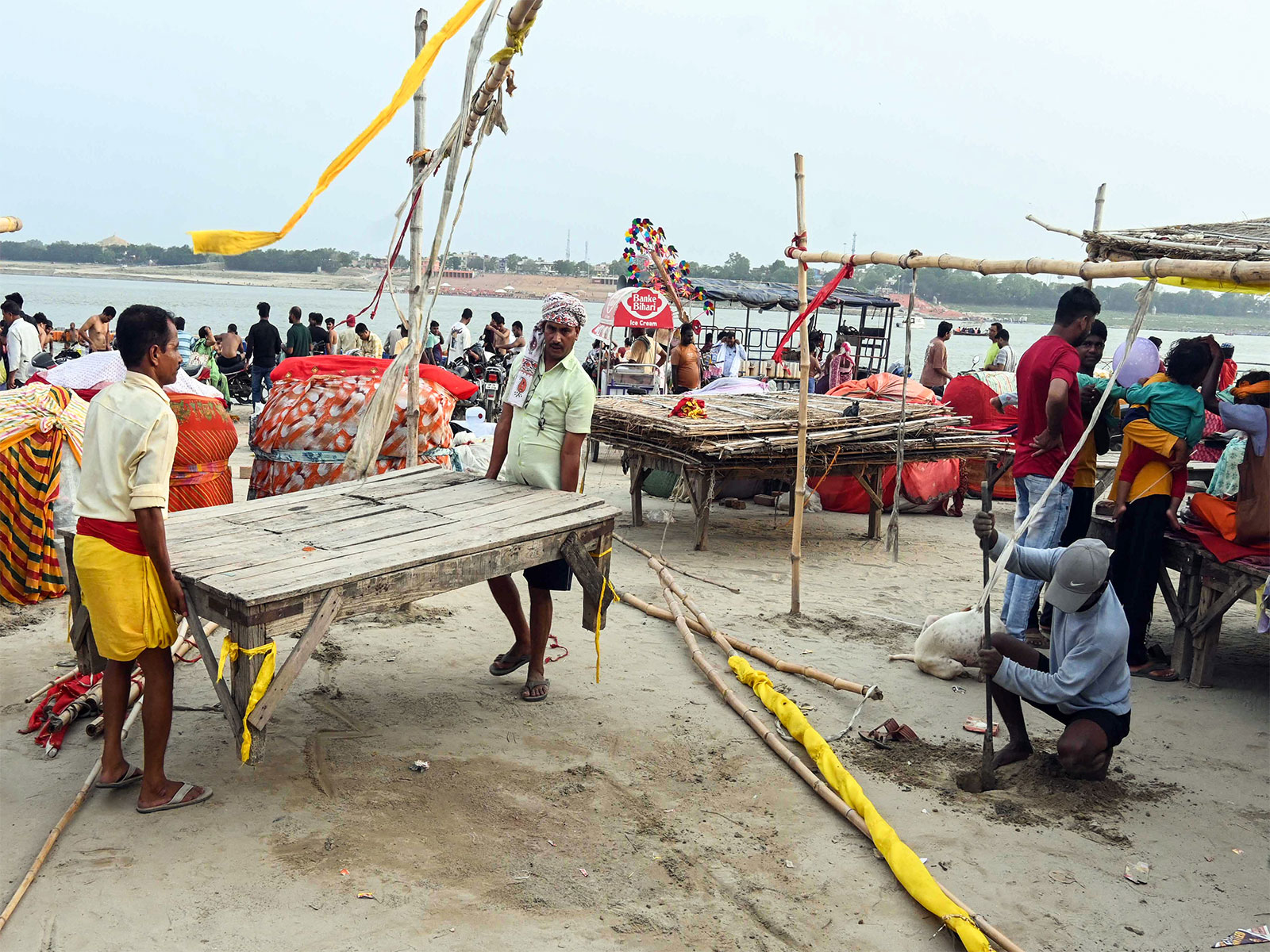 People move to safer places as monsoon rains flood Sangam area in Prayagraj (File Photo/ANI) People move to safer places as monsoon rains flood Sangam area in Prayagraj (File Photo/ANI)