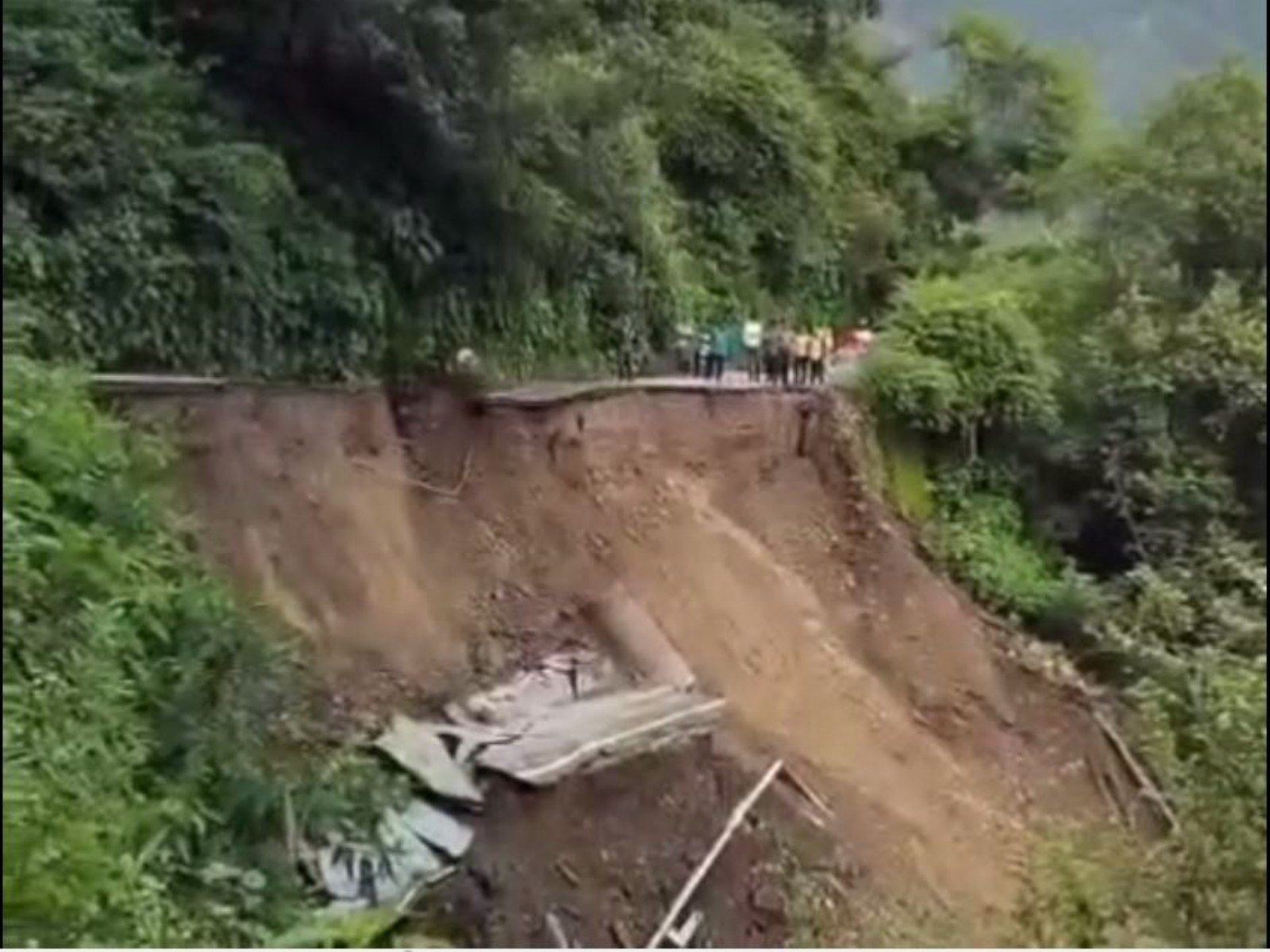 NH-707A closed due to a washout between Dimta Bend and Jeevan Ashram (Photo/ANI) NH-707A closed due to a washout between Dimta Bend and Jeevan Ashram (Photo/ANI)