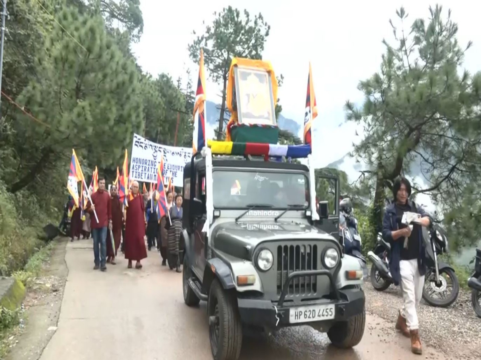 Over 5,000 Tibetans march in Dharamshala against China on 49th day of Lobsang Rangzen's self-immolation (Photo/ANI)