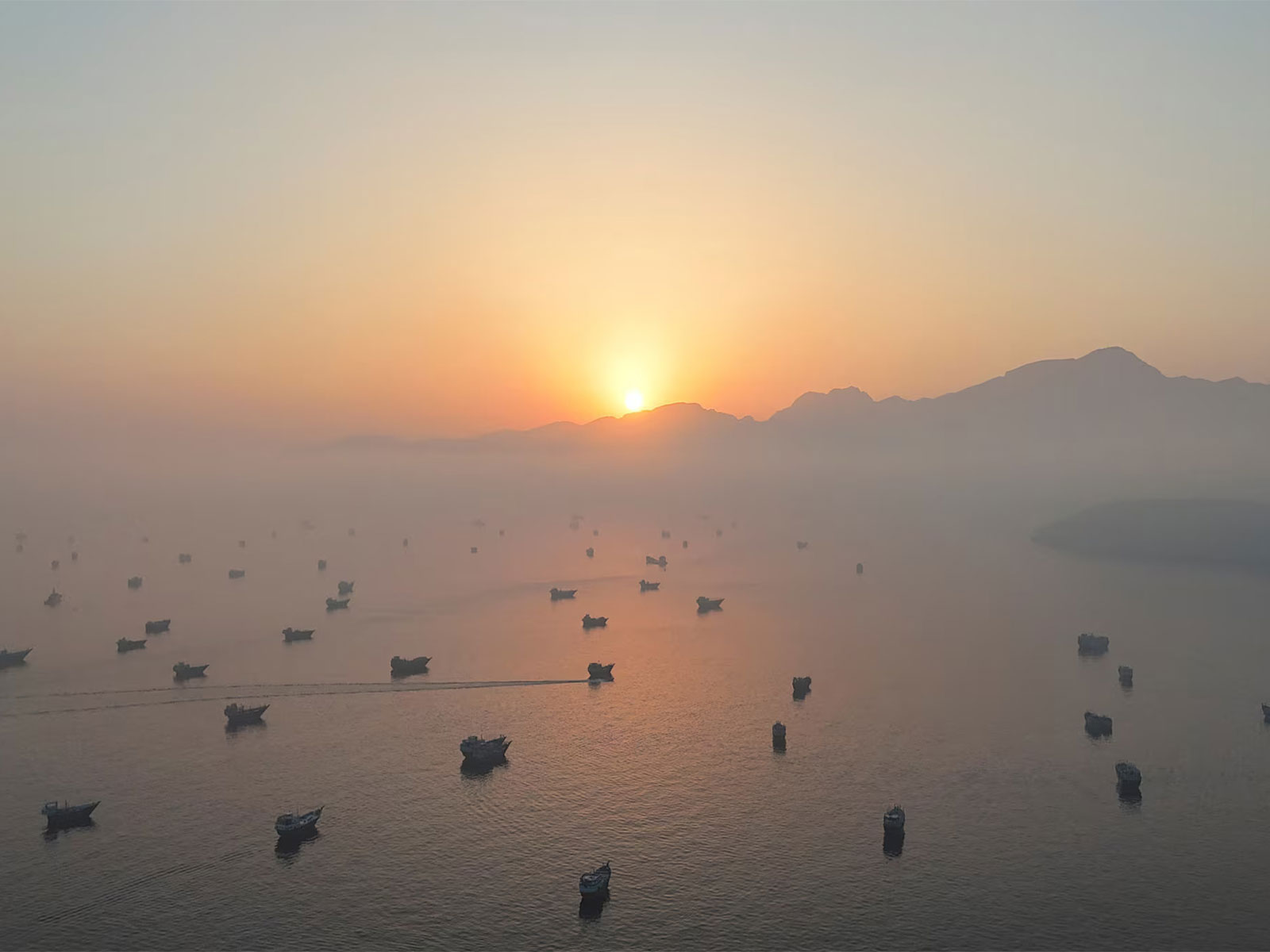 A drone view shows vessels in the Strait of Hormuz, as seen from Musandam, Oman. (Photo/Reuters)