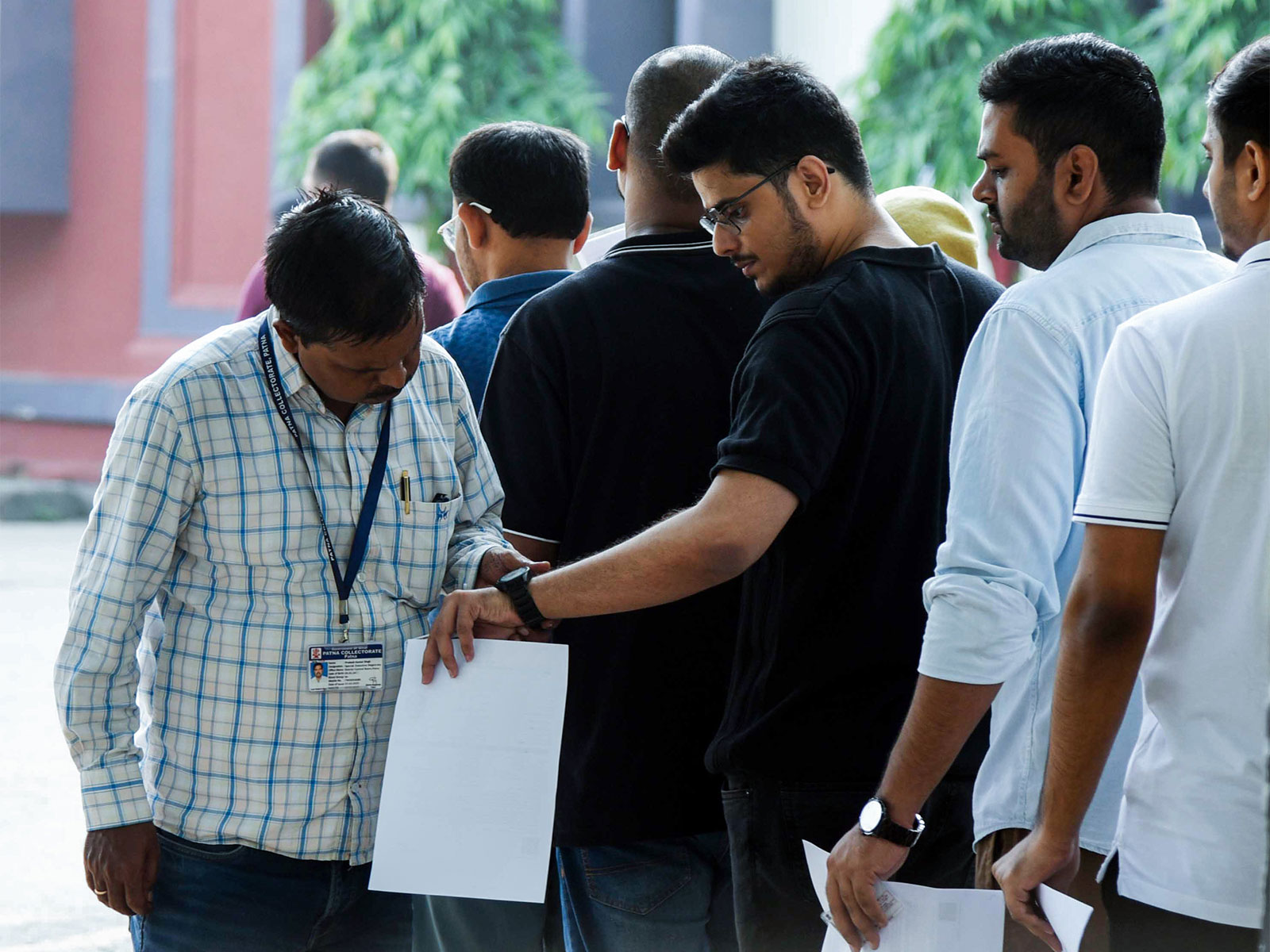 Aspirants queue up for a security check at an examination centre for the UPSC Civil Services (Main) Exam, in Patna (Photo/ANI) Aspirants queue up for a security check at an examination centre for the UPSC Civil Services (Main) Exam, in Patna (Photo/ANI)
