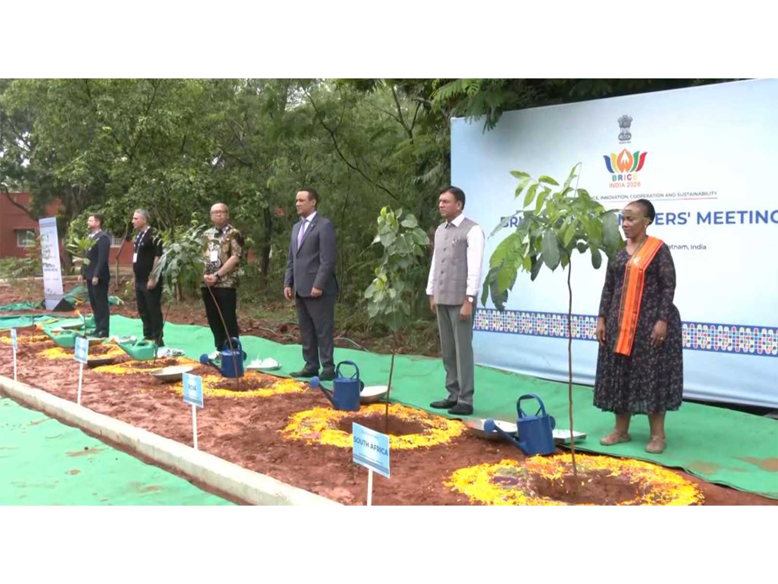 Union Minister Mansukh Mandaviya plants saplings with BRICS delegates (Photo/ANI) Union Minister Mansukh Mandaviya plants saplings with BRICS delegates (Photo/ANI)