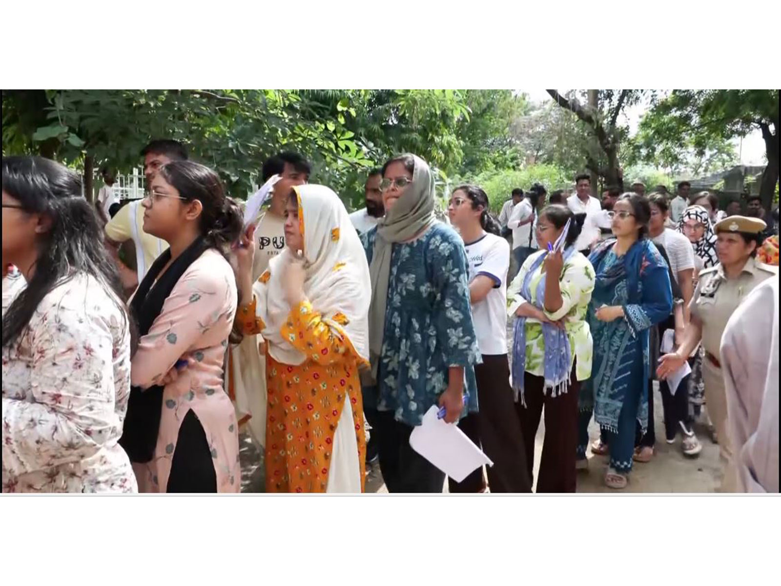Candidates gathered outside the Satya Sai PG Girls College examination center (Photo/ANI) Candidates gathered outside the Satya Sai PG Girls College examination center (Photo/ANI)