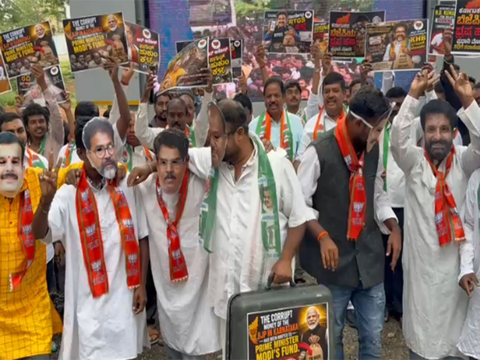 Karnataka Congress workers counter-protest against BJP (Photo/ANI) Karnataka Congress workers counter-protest against BJP (Photo/ANI)