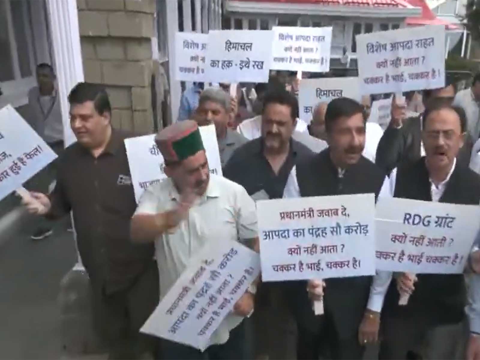 Congress stages protest over inflation outside Himachal Assembly (Photo/ANI) Congress stages protest over inflation outside Himachal Assembly (Photo/ANI)