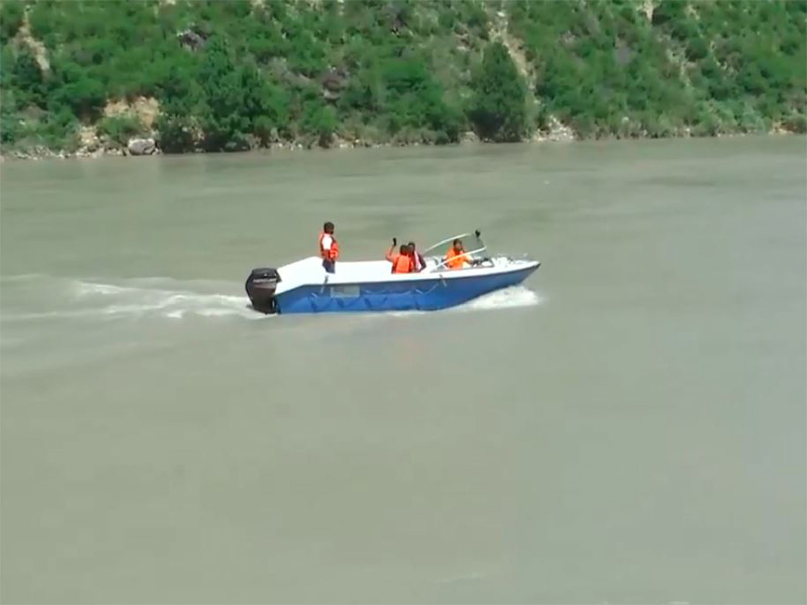 Doda, J-K: SDRF team rescues a person after a sand-extraction boat was swept away by strong currents in the Chenab River (Photo/ANI)