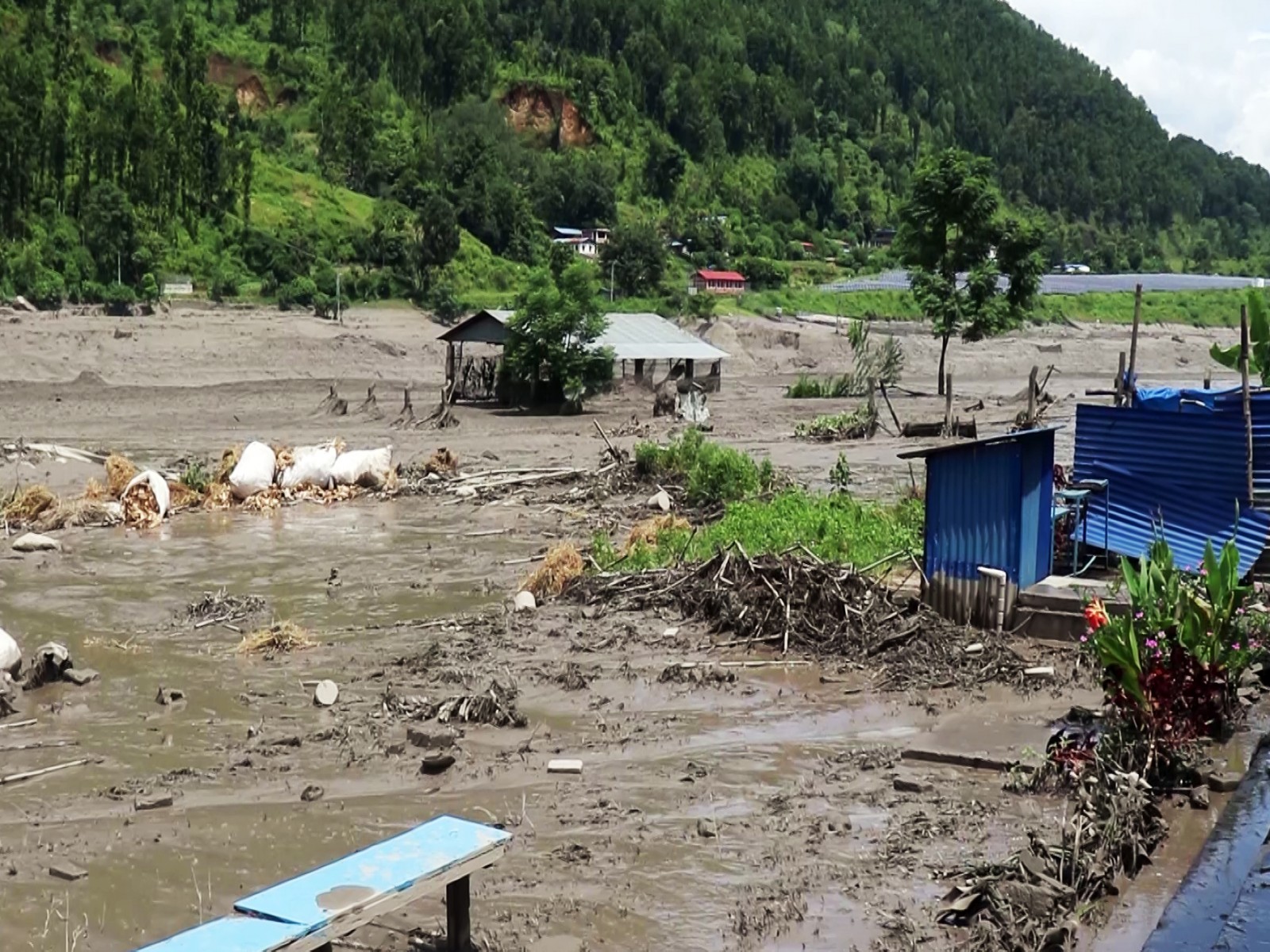 Flash flood ravages Nepal’s Rasuwa (Photo/ANI) Flash flood ravages Nepal’s Rasuwa (Photo/ANI)