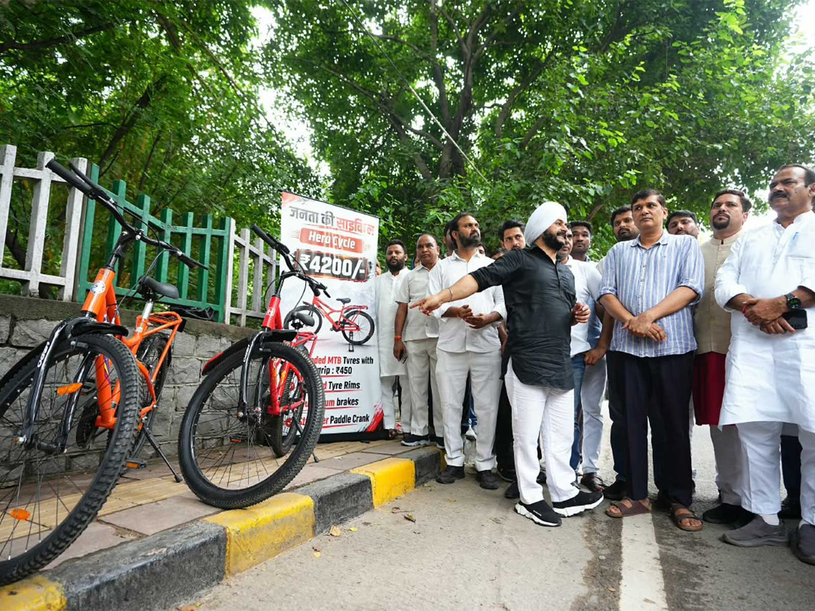 AAP leaders and MLAs, led by Saurabh Bharadwaj, place bicycles outside the LG’s office during a protest against alleged scams and demand the resignation of Minister Ashish Sood.  (Photo/ANI)