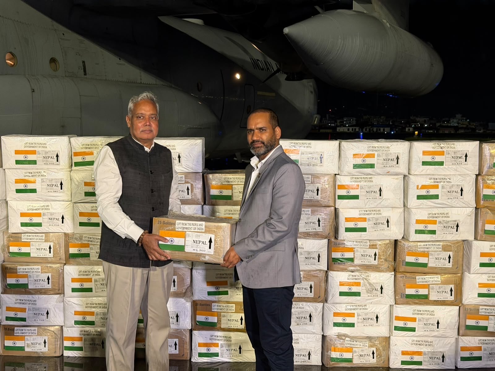 Indian Ambassador to Nepal Naveen Srivastava handing over humanitarian aid materials from India to Nepal's Minister for Culture, Tourism and Civil Aviation, Khadka Raj Poudel. (Photo: X/@MEAIndia) Indian Ambassador to Nepal Naveen Srivastava handing over humanitarian aid materials from India to Nepal's Minister for Culture, Tourism and Civil Aviation, Khadka Raj Poudel. (Photo: X/@MEAIndia)