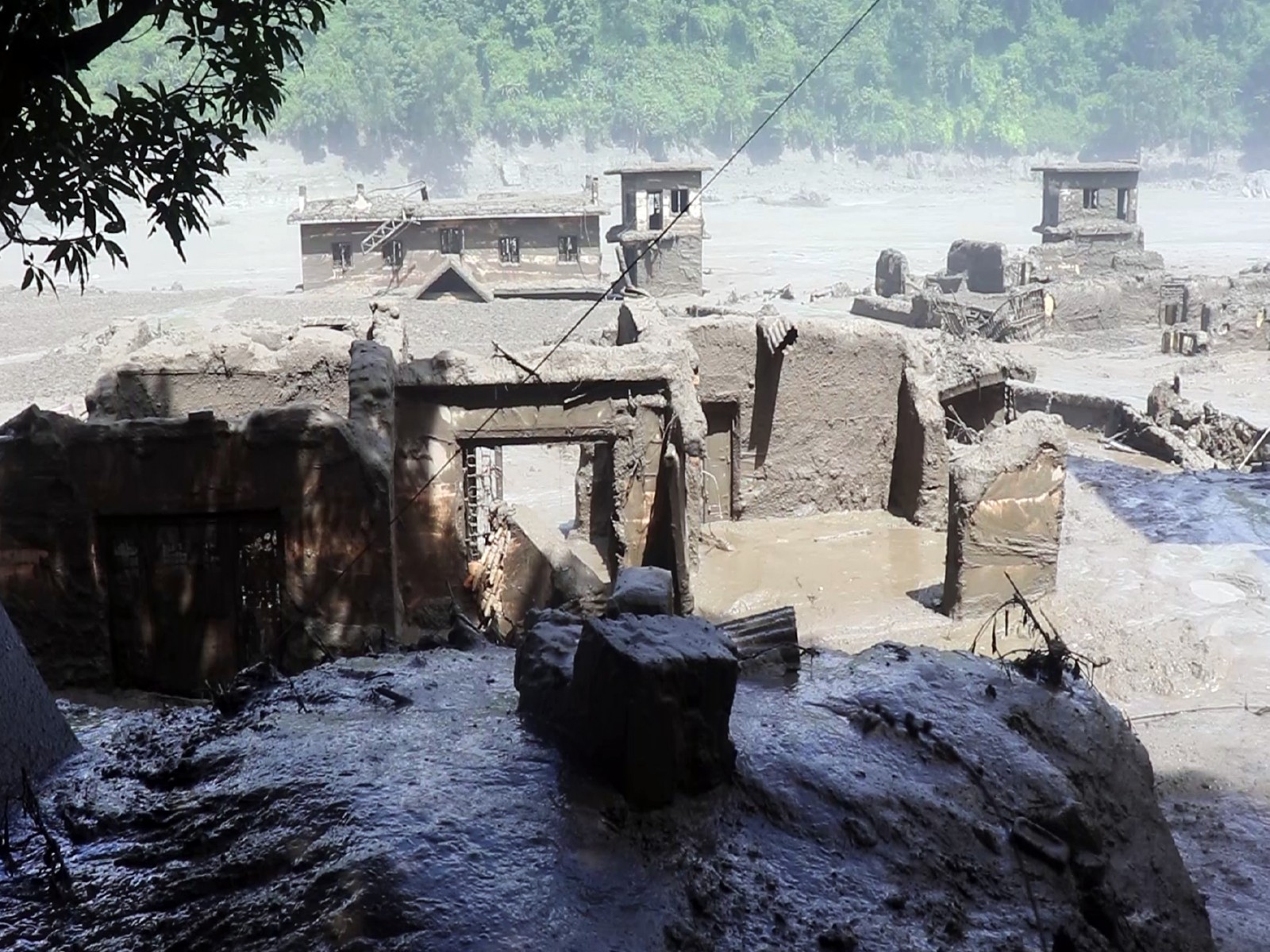 Flash flood ravages Nepalโs Rasuwa (Photo/ANI) Flash flood ravages Nepalโs Rasuwa (Photo/ANI)
