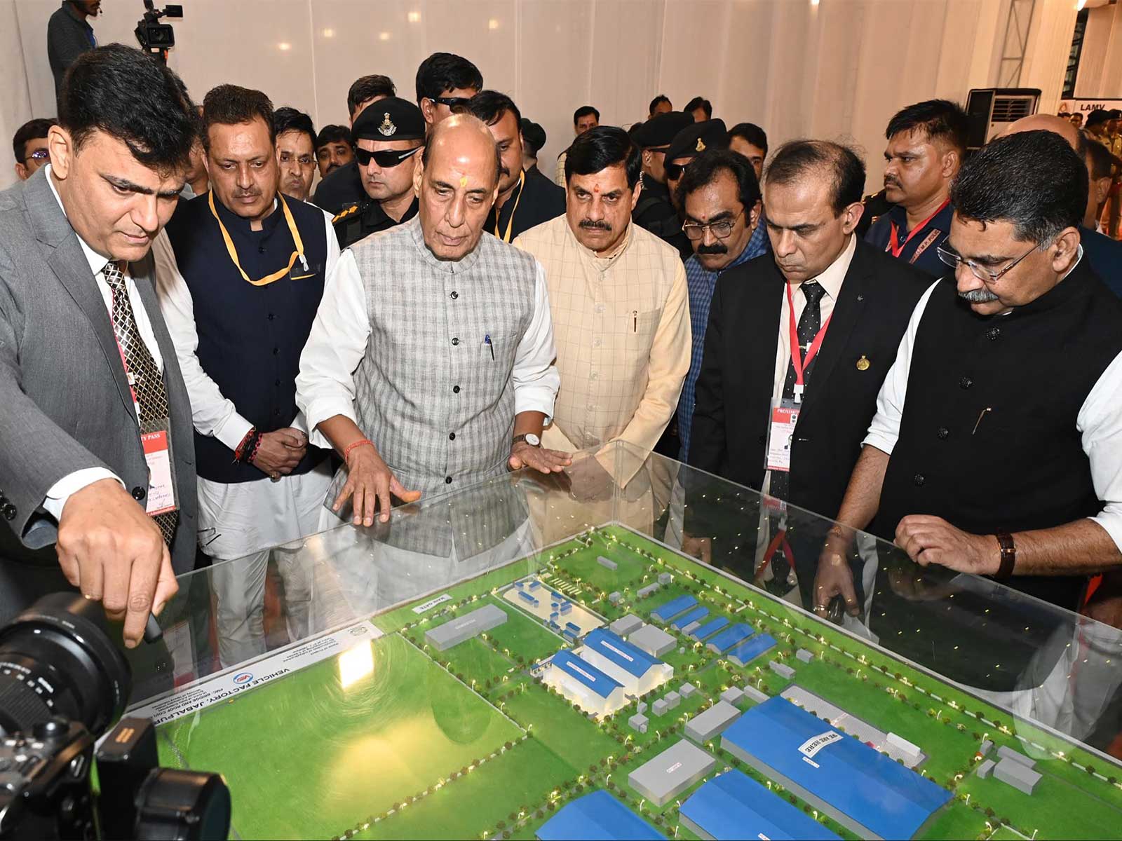 Union Defence Minister Rajnath Singh inspects site's model  (Photo/ANI)