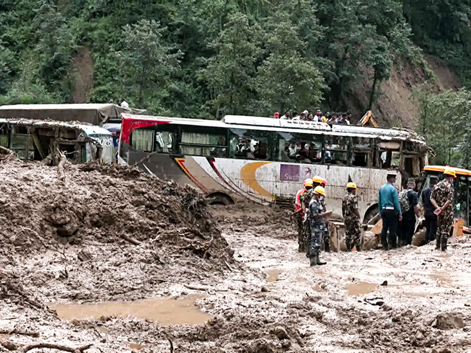 Floodwaters and debris inundate areas in Nepal following heavy flooding, as rescue and relief operations continue (Photo/ANI) Floodwaters and debris inundate areas in Nepal following heavy flooding, as rescue and relief operations continue (Photo/ANI)