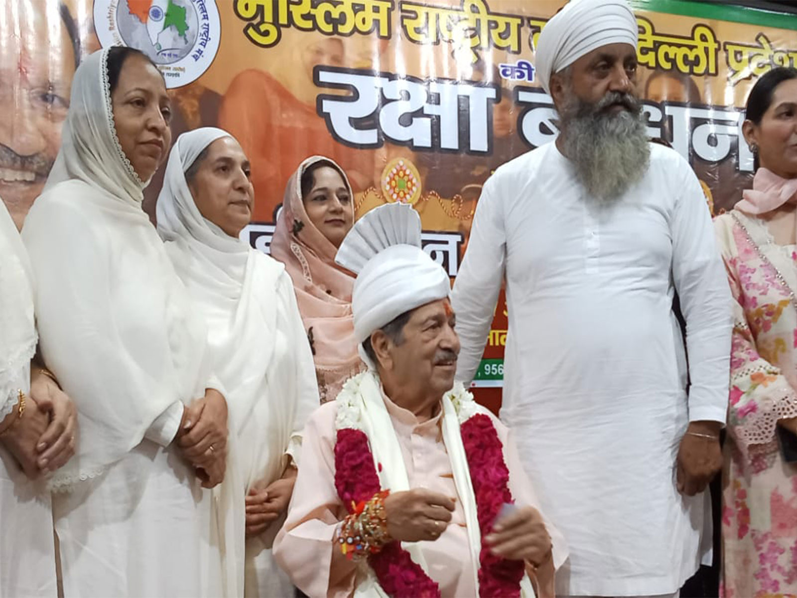 Muslim women tie Rakhi to RSS leader Indresh Kumar during a Rakshabandhan programme at Ghalib Auditorium in Delhi (Photo/ANI) Muslim women tie Rakhi to RSS leader Indresh Kumar during a Rakshabandhan programme at Ghalib Auditorium in Delhi (Photo/ANI)