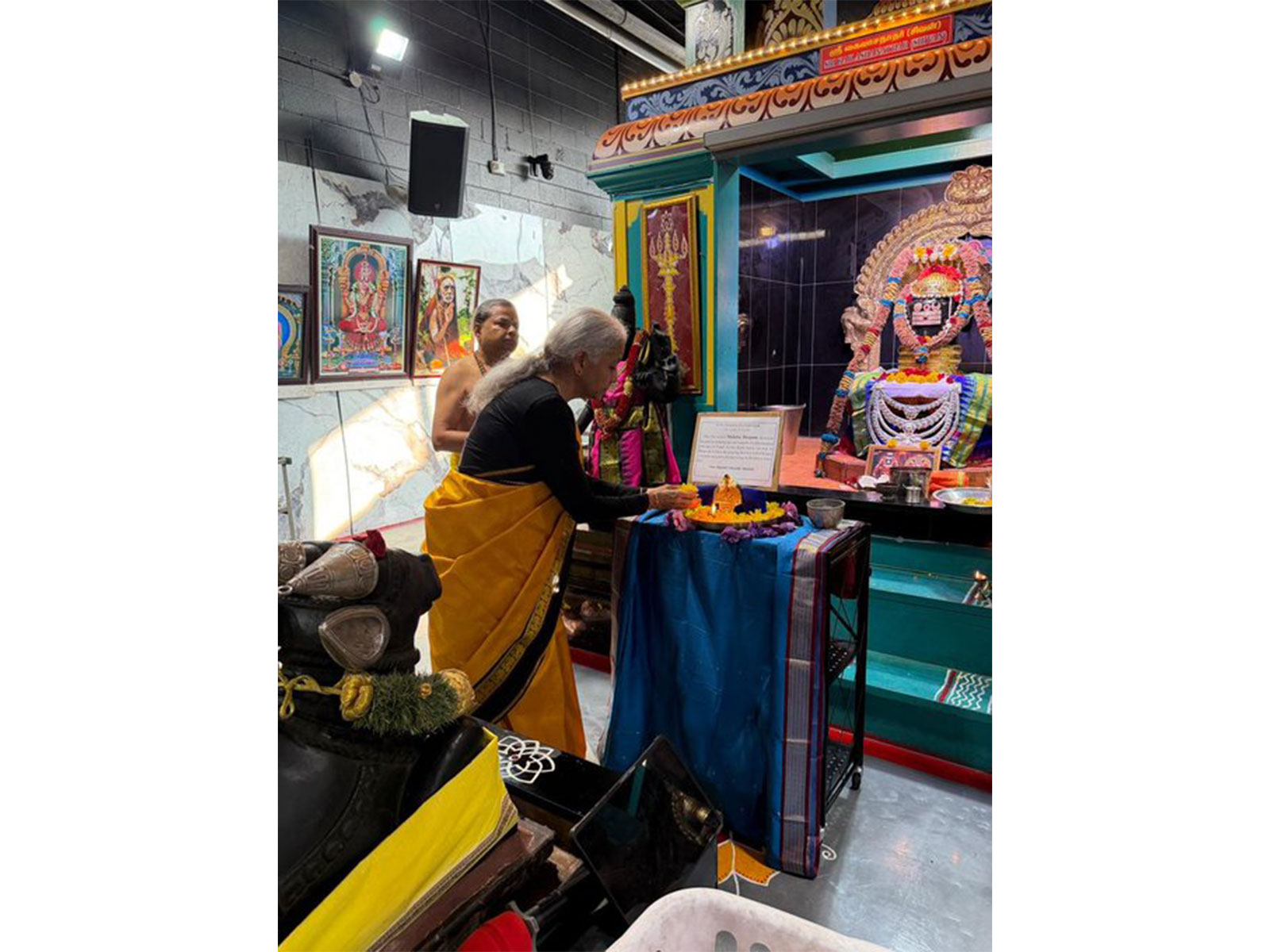 Sitharaman lights Moksha Deepam for flood victims (PHOTO/ @nsitharamanoffc) Sitharaman lights Moksha Deepam for flood victims (PHOTO/ @nsitharamanoffc)