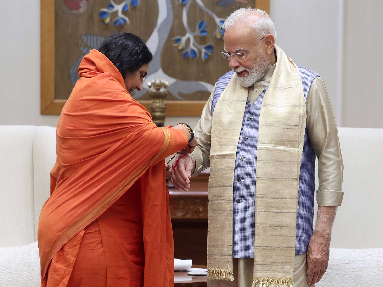 Sadhvi Ritambhara ties a Raksha Sutra to PM Modi on the occasion of Raksha Bandhan (Photo/X/@DidiRitambhara)
