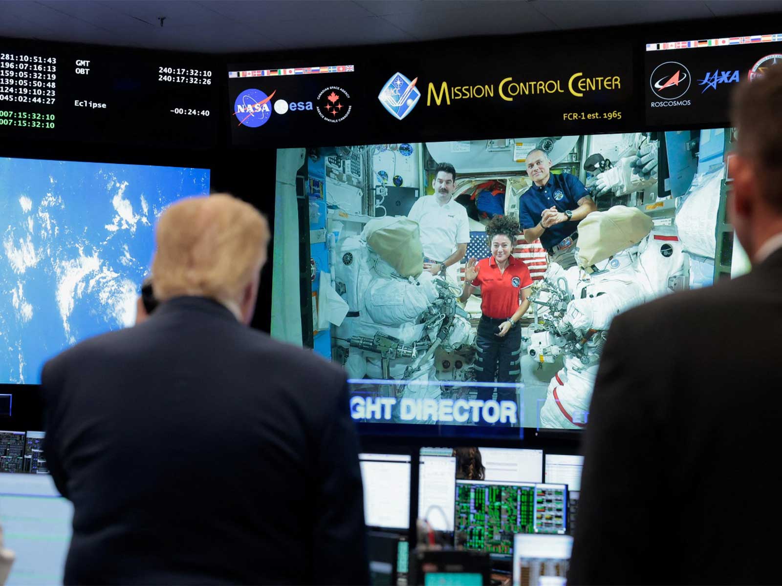U.S. President Trump has a call with crew members aboard the International Space Station, from NASA Mission Control Center in Houston (Photo/Reuters)