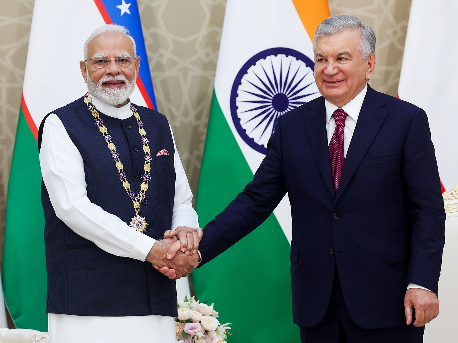 Prime Minister Narendra Modi with Uzbekistan President Shavkat Mirziyoyev (Photo/ANI)