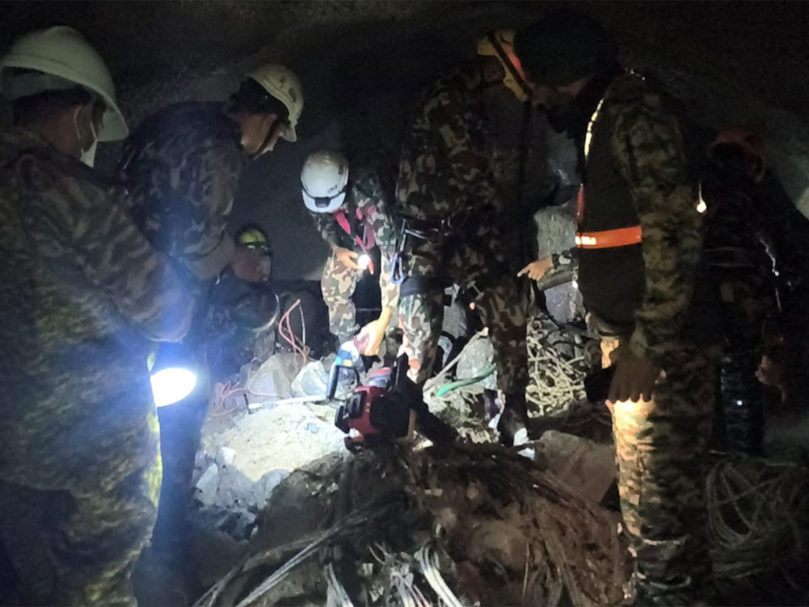 India's specialised tunnel search and rescue team continue to work in flood-hit Nepal (Photo/MEA) India's specialised tunnel search and rescue team continue to work in flood-hit Nepal (Photo/MEA)