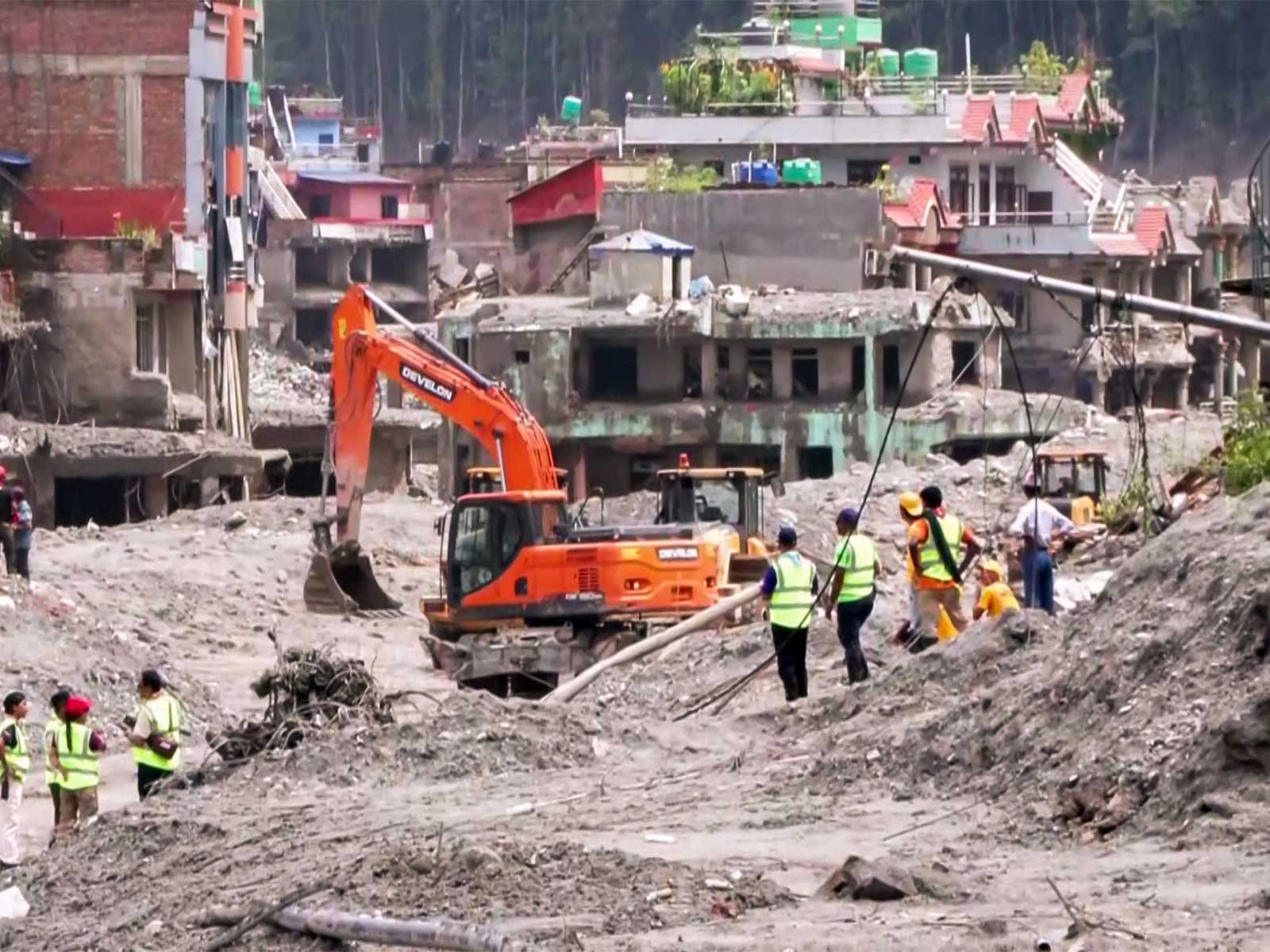 Debris clearance underway in flood-damaged residential area in Trishuli, Nuwakot (Photo/ANI) Debris clearance underway in flood-damaged residential area in Trishuli, Nuwakot (Photo/ANI)