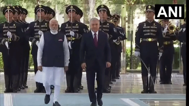 Prime Minister Narendra Modi recieves ceremonial welcome in presence of President Shavkat Mirziyoyev (Photo/DD) Prime Minister Narendra Modi recieves ceremonial welcome in presence of President Shavkat Mirziyoyev (Photo/DD)