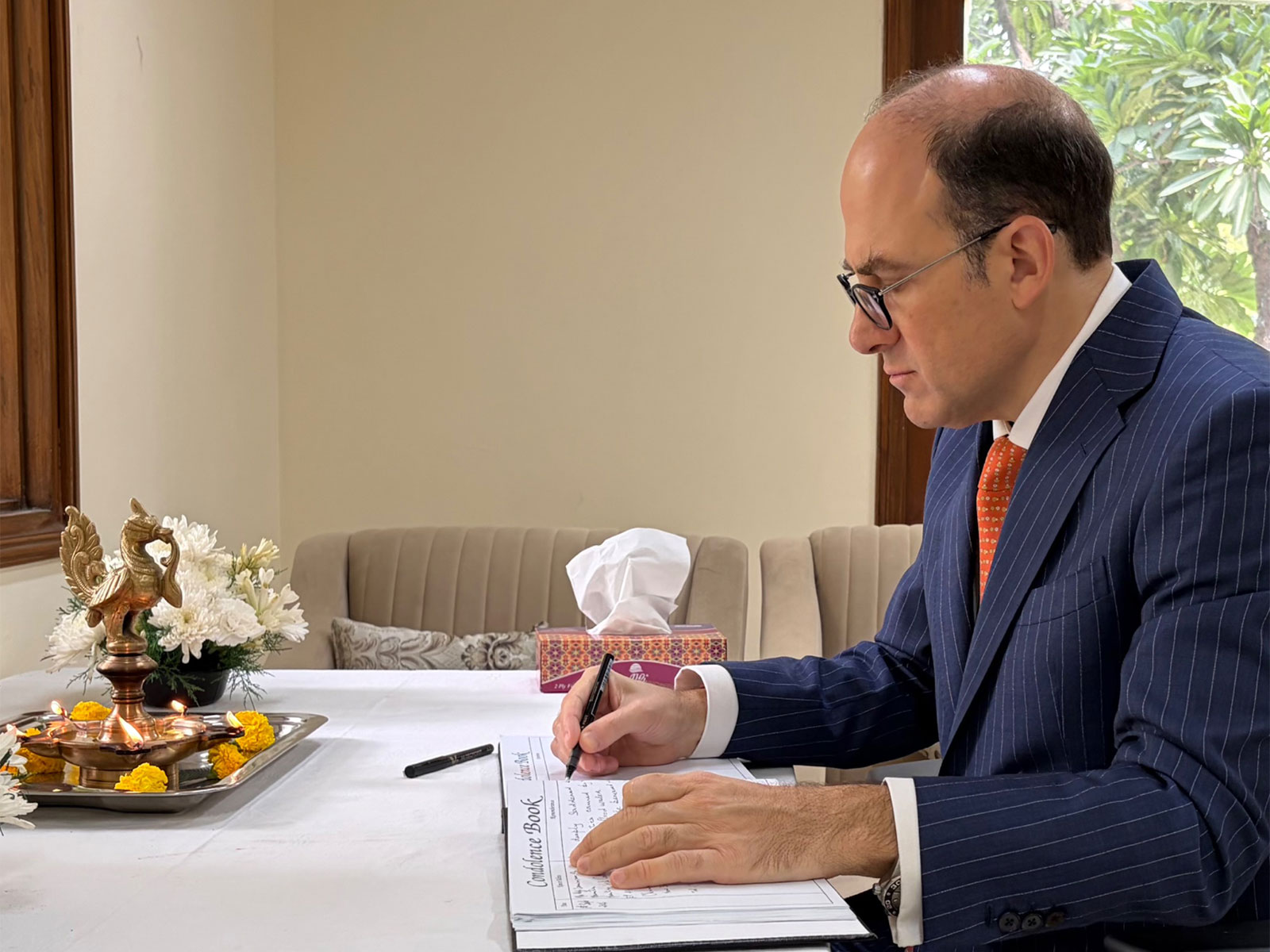 Argentine Ambassador to India Mariano Caucino signs Book of Condolence at the Nepalese Embassy in India (Photo/X.@CaucinoMariano)
