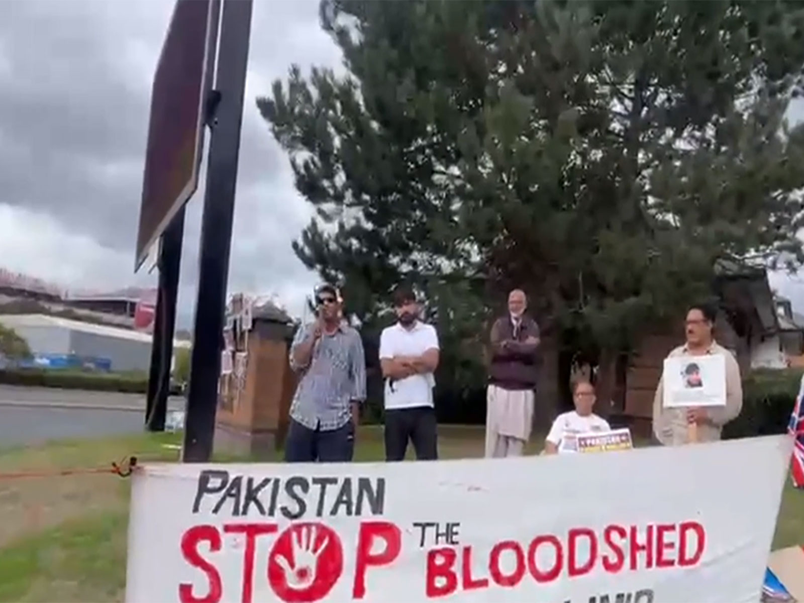 Members of the Kashmiri diaspora holding demonstrations outside the Pakistani Consulate in Bradford. (Photo/ANI)