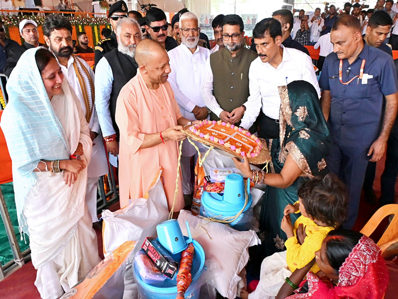 Uttar Pradesh Chief Minister Yogi Adityanath during a relief material distribution programme for flood-affected families on August 29 (File Photo/ANI)