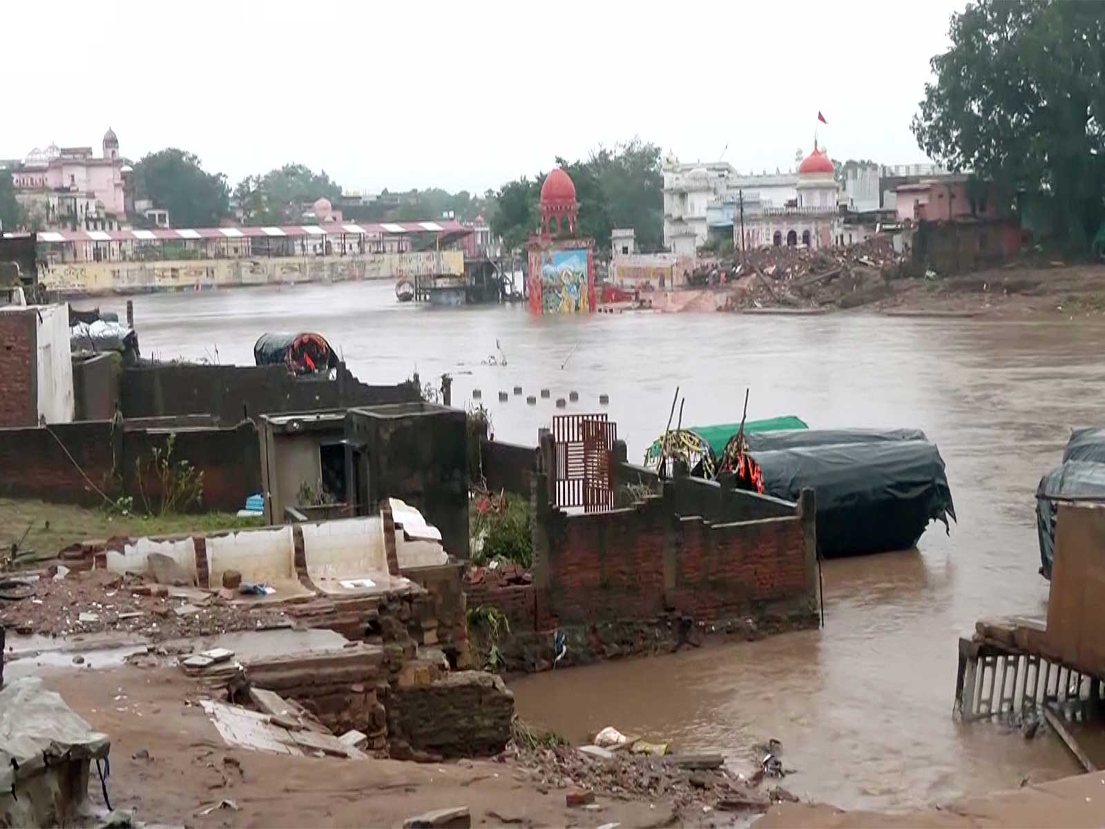 Mandakini River overflows submerging temples ghats and homes in Chitrakoot (Photo/ANI)