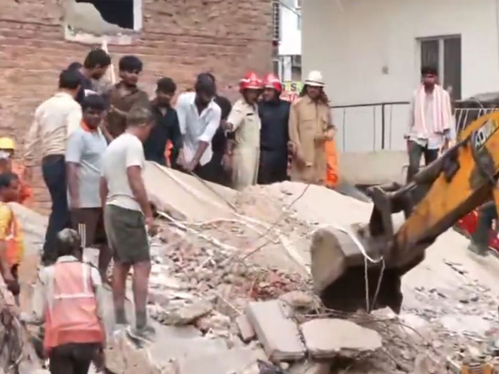 A resuce operation is underway after a building collapsed near Satya Niketan in South-West Delhi (Photo/ANI)