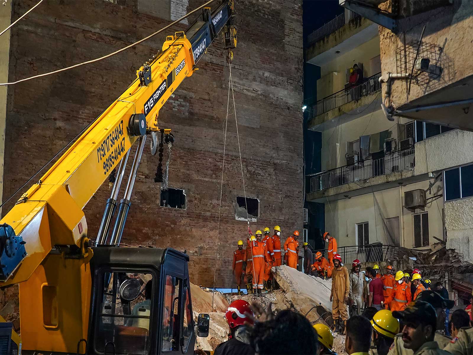 Rescue operations underway at the Satya Niketan building collapse site (Photo/ANI) Rescue operations underway at the Satya Niketan building collapse site (Photo/ANI)
