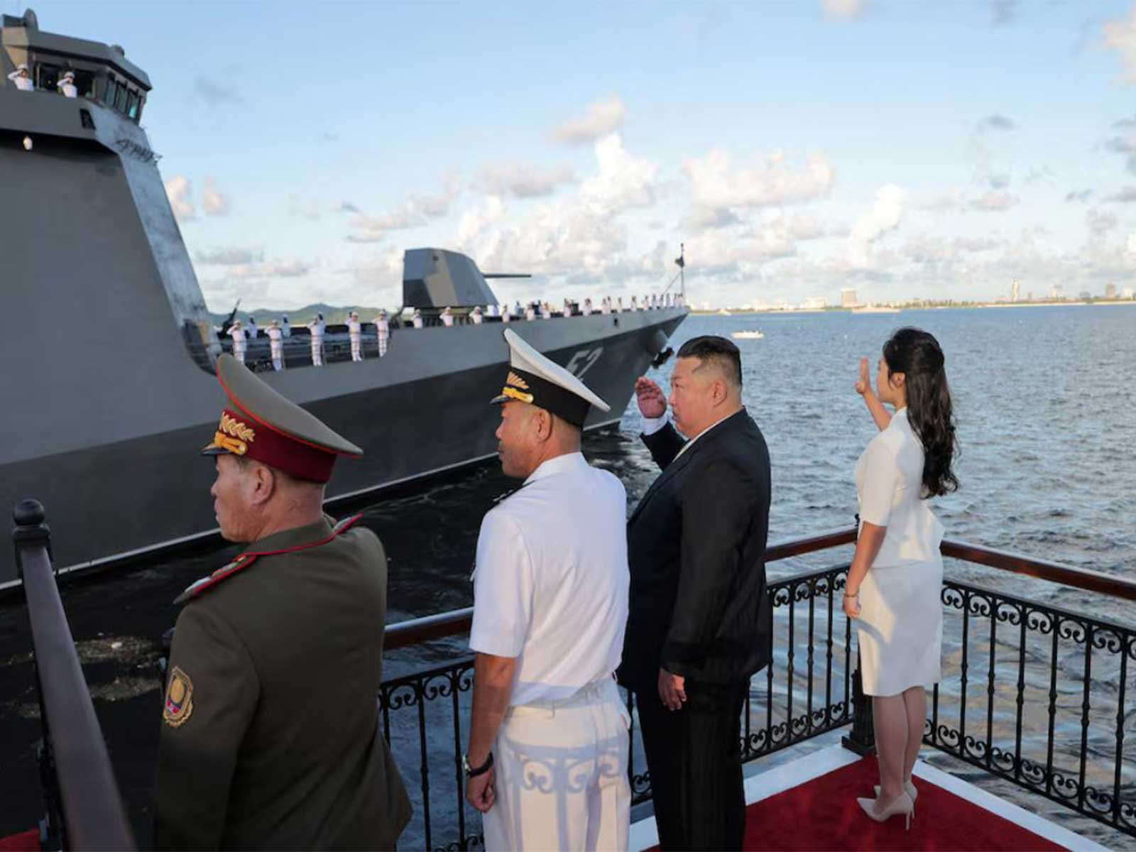 North Korean leader Kim Jong Un, accompanied by his daughter Kim Ju Ae, attends the commissioning ceremony for the North Korean leader Kim Jong Un, accompanied by his daughter Kim Ju Ae, attends the commissioning ceremony for the