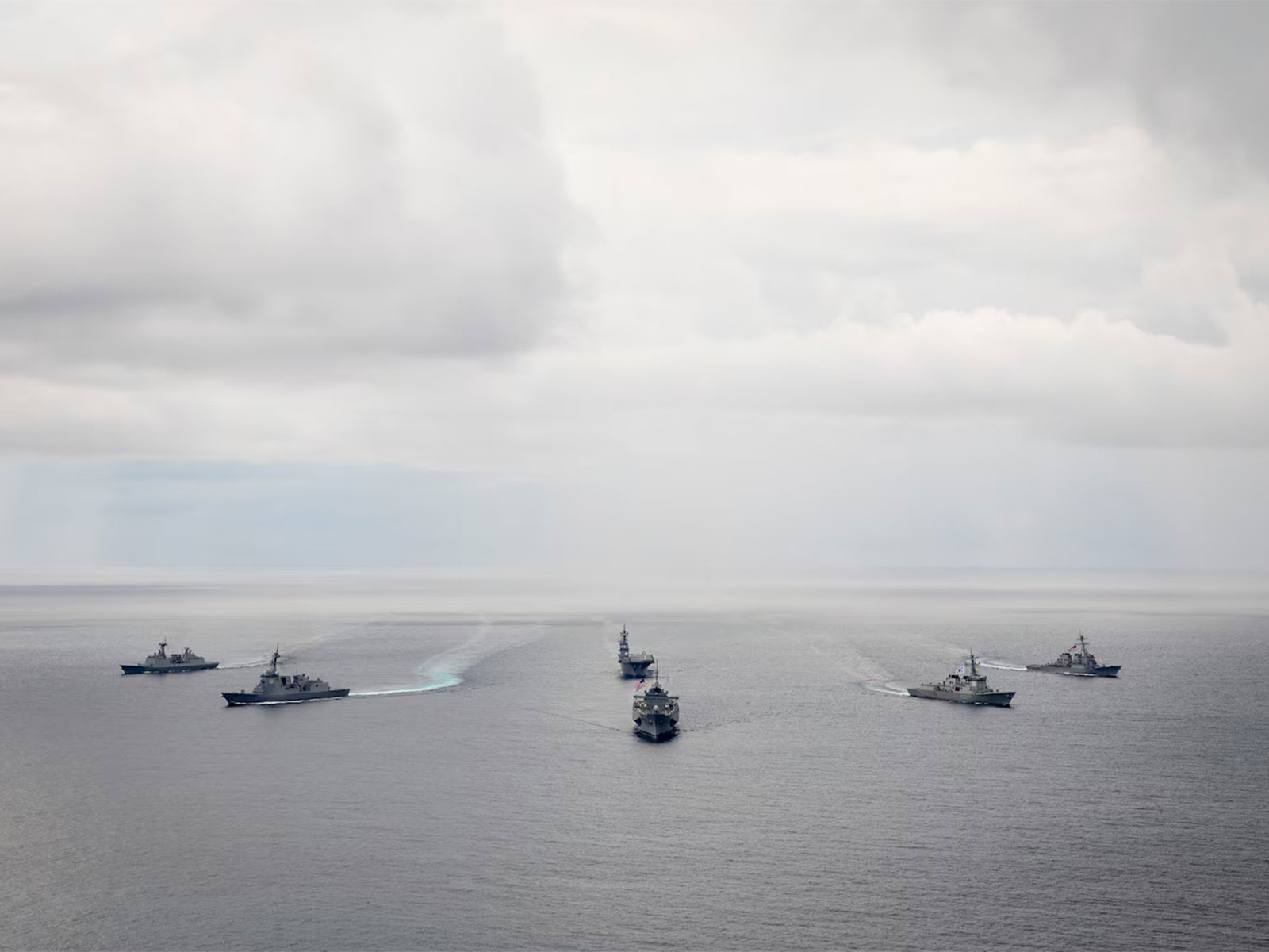 Naval vessels from the United States, South Korea, and Japan participate in the trilateral 