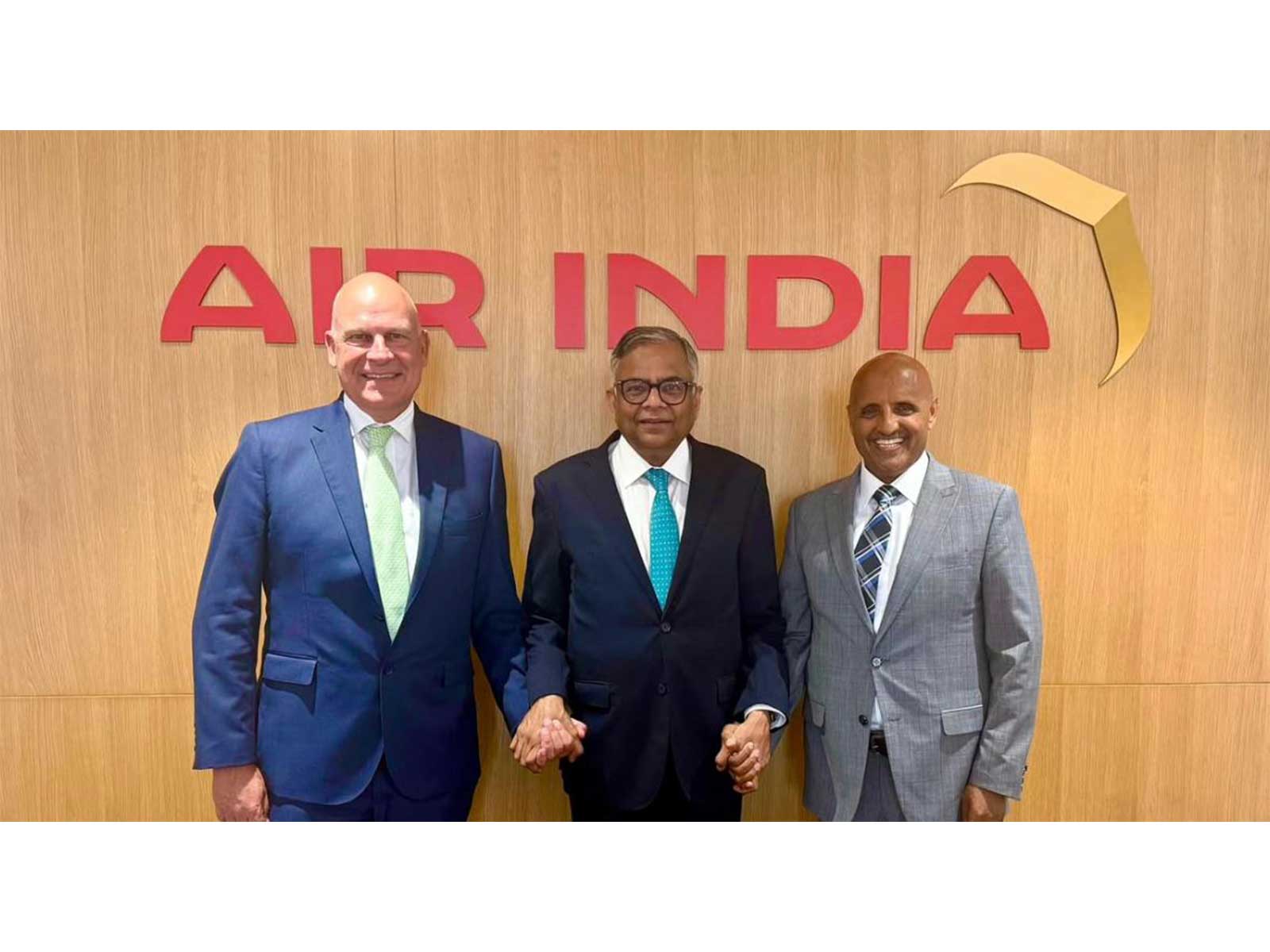 Air India outgoing CEO Campbell Wilson, Air India Chairman N. Chandrasekaran with Air India's new CEO, Tewolde Gebremariam (Photo/AIr India)
