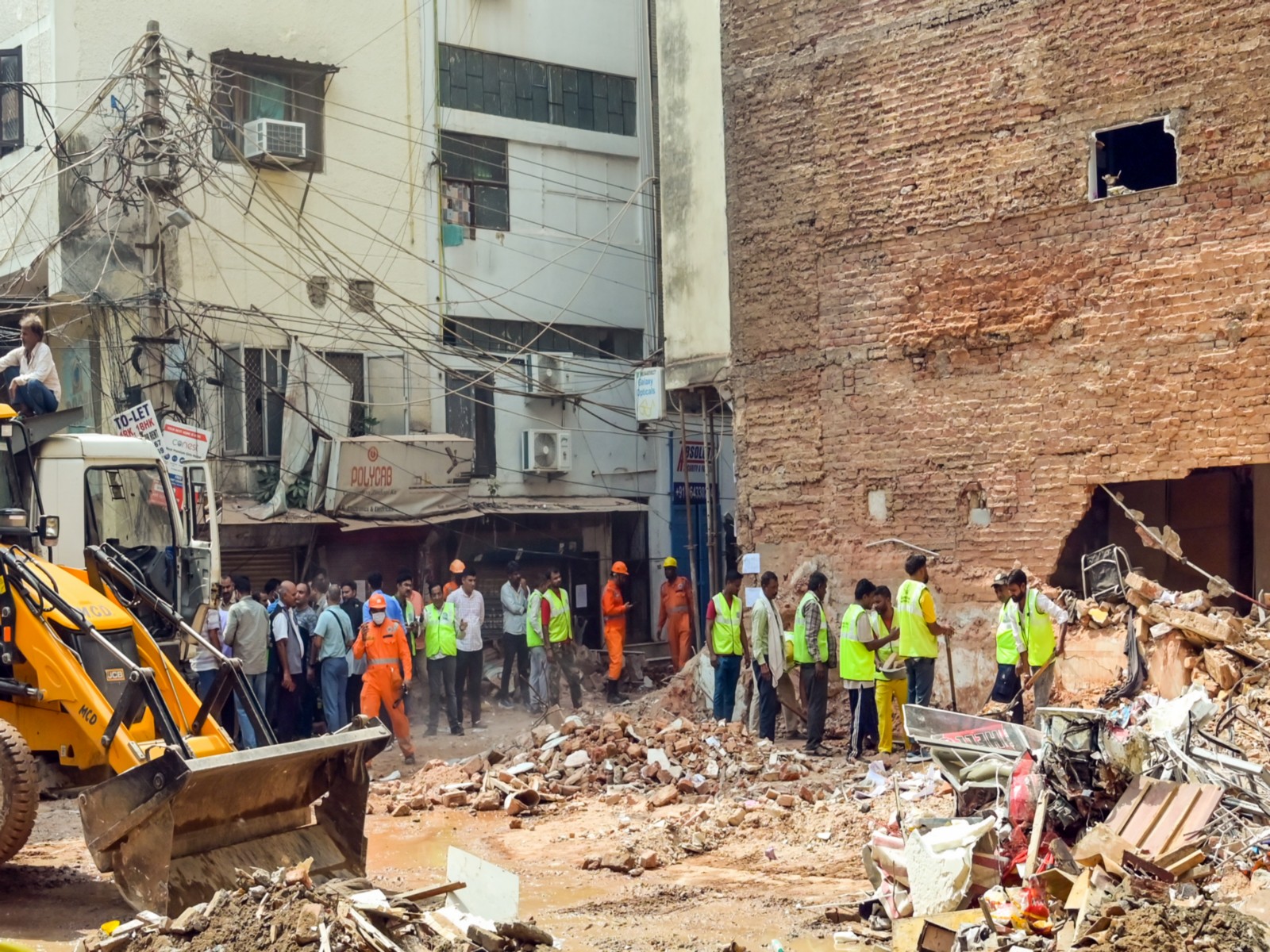 Visuals from the Satya Niketan building collapse site (File Photo/ANI) Visuals from the Satya Niketan building collapse site (File Photo/ANI)