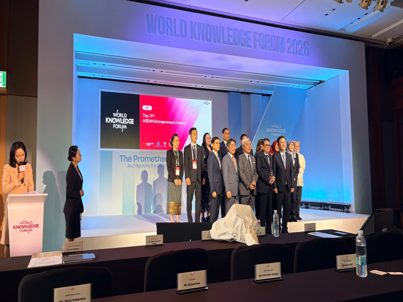 Delegates and awardees pose on stage during the 27th World Knowledge Forum in Seoul. (Photo/ANI)