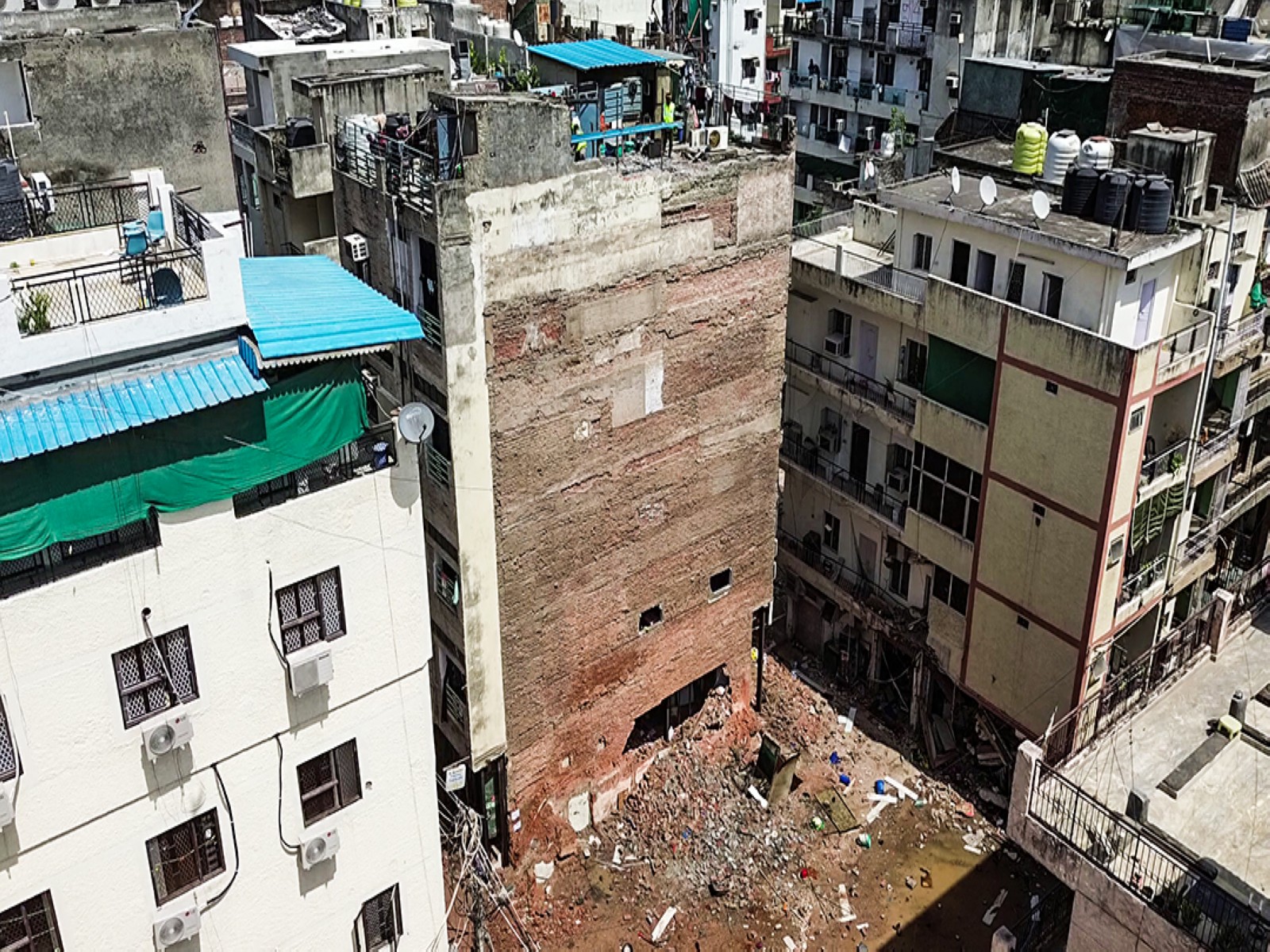 An aerial view from the Satya Niketan building collapse site (File Photo/ANI) An aerial view from the Satya Niketan building collapse site (File Photo/ANI)