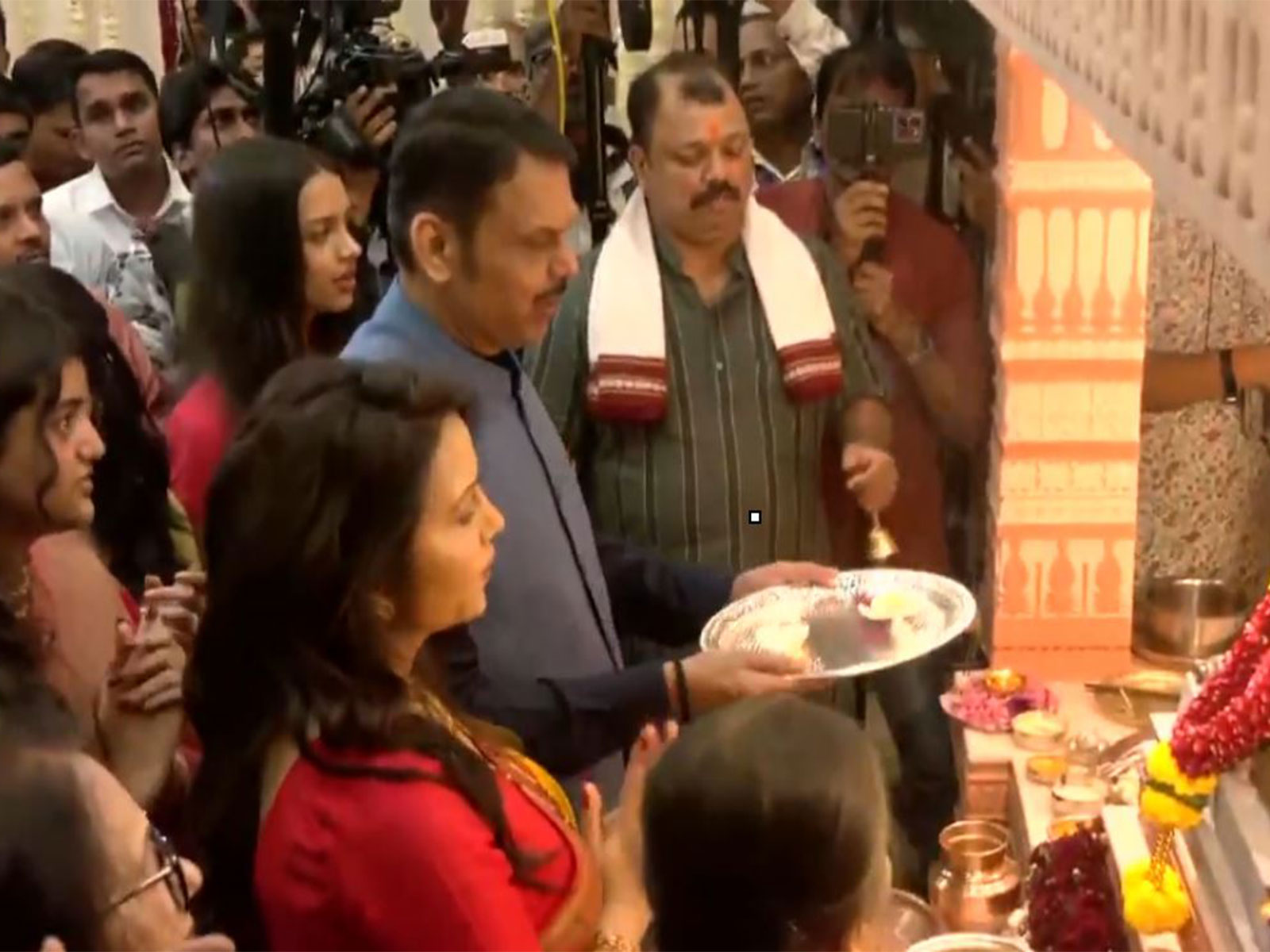 Maharashtra CM Devendra Fadnavis, along with his wife Amruta Fadnavis, performs aarti on Ganesh Chaturthi (Photo/ANI) Maharashtra CM Devendra Fadnavis, along with his wife Amruta Fadnavis, performs aarti on Ganesh Chaturthi (Photo/ANI)