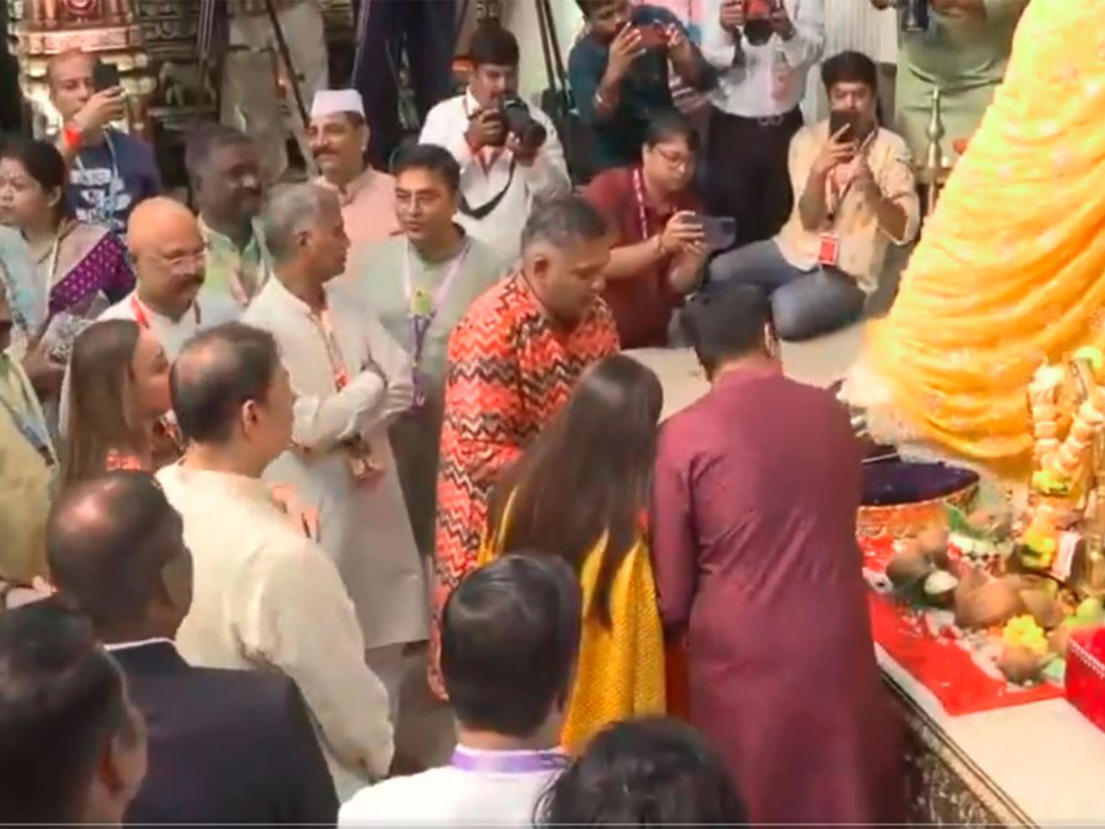 Adani family offering prayers (Photo/ANI) Adani family offering prayers (Photo/ANI)