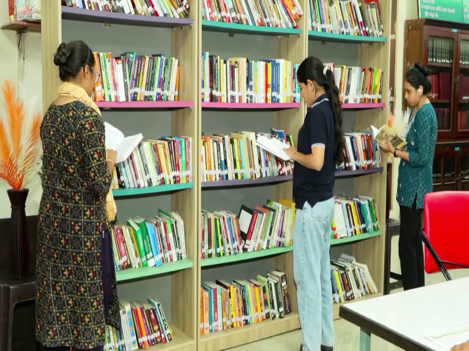 Students reading books at Rajkot District library (Photo/ANI)