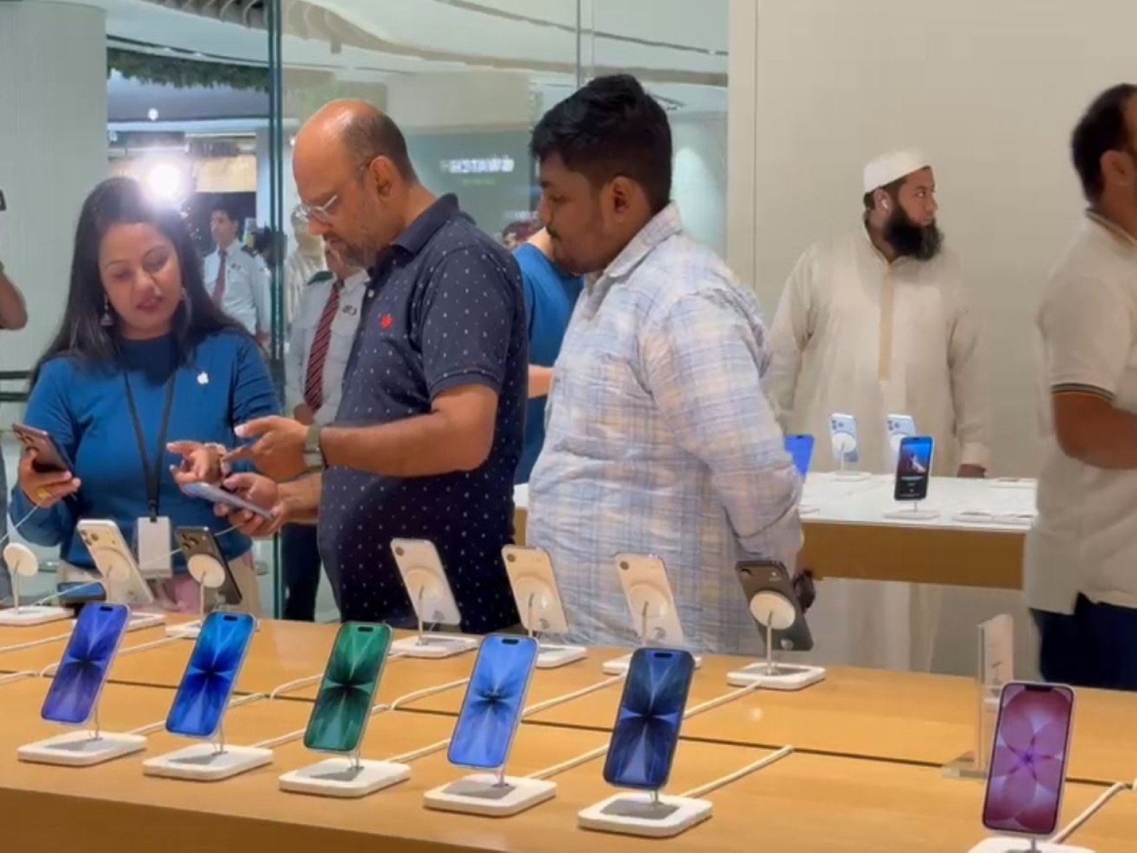 Customers at an Apple store in Bengaluru (Photo/ANI) Customers at an Apple store in Bengaluru (Photo/ANI)
